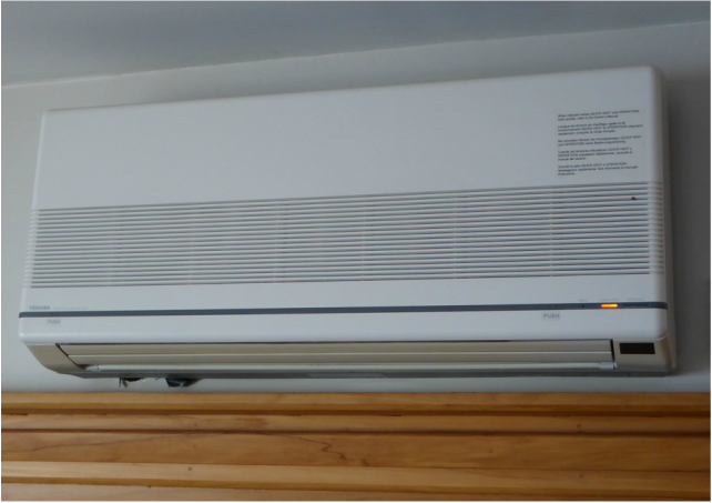Not exactly sleek or stylish, but this Christchurch heat pump still does the job after 17 years.